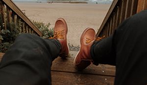 Preview wallpaper legs, boots, stairs, beach, rock