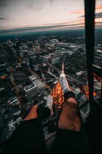 Preview wallpaper legs, city, aerial view, road