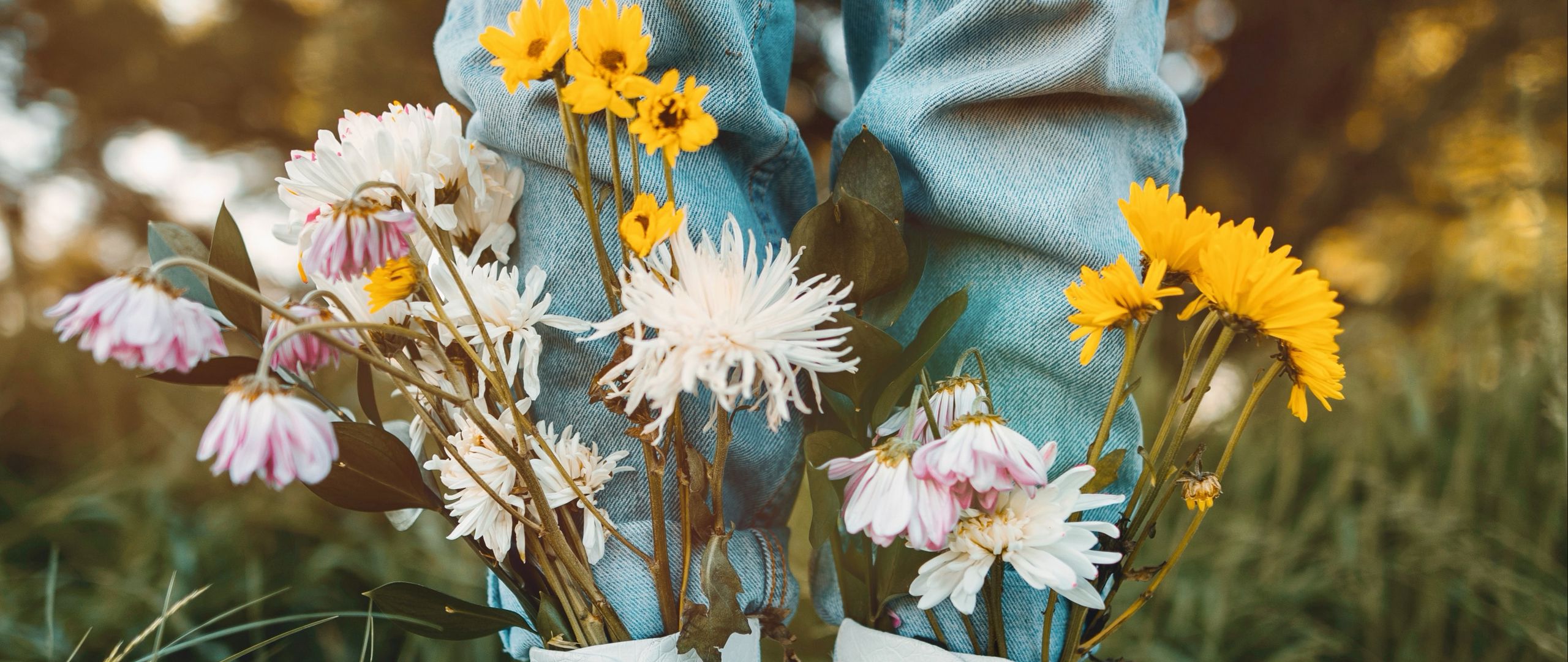 Download wallpaper 2560x1080 legs, flowers, boots, creative dual wide