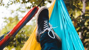 Preview wallpaper legs, hammock, shoes, sneakers