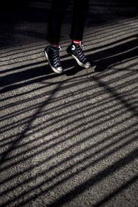 Preview wallpaper legs, jump, sneakers, shoes, shadow