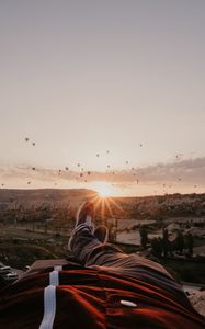 Preview wallpaper legs, landscape, sunset, air balloons, mountains, rest