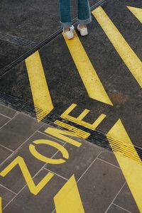 Preview wallpaper legs, marking, yellow, asphalt