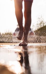 Preview wallpaper legs, puddle, spray, water, drops