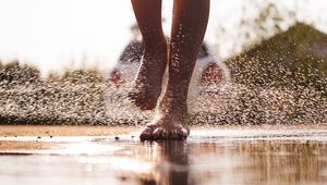 Preview wallpaper legs, puddle, spray, water, drops