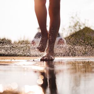 Preview wallpaper legs, puddle, spray, water, drops