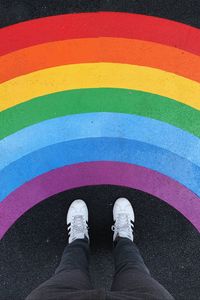 Preview wallpaper legs, rainbow, sneakers, colorful, asphalt