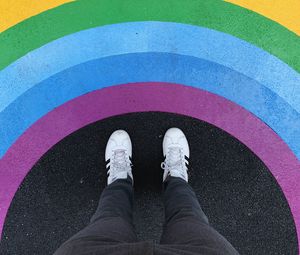 Preview wallpaper legs, rainbow, sneakers, colorful, asphalt