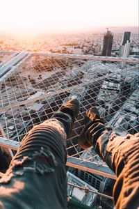 Preview wallpaper legs, roof, city, overview, aerial view