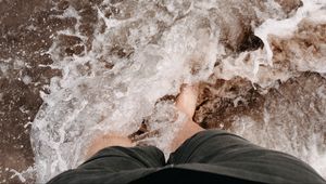 Preview wallpaper legs, sea, spray, foam, coast