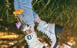 Preview wallpaper legs, shoes, flowers, jeans, grass