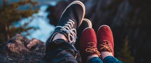 Preview wallpaper legs, shoes, sneakers, cliff, sea