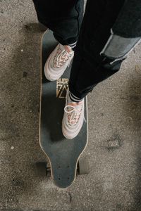 Preview wallpaper legs, skateboard, sneakers, asphalt