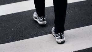 Preview wallpaper legs, sneakers, asphalt, walk