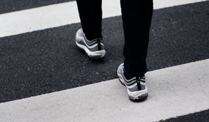 Preview wallpaper legs, sneakers, asphalt, walk