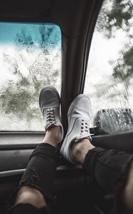 Preview wallpaper legs, sneakers, car, glass, rain