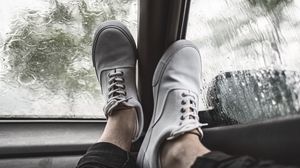 Preview wallpaper legs, sneakers, car, glass, rain