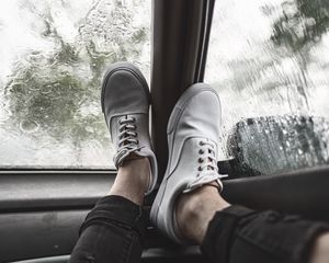 Preview wallpaper legs, sneakers, car, glass, rain