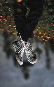 Preview wallpaper legs, sneakers, field, flowers, blur