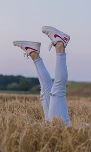 Preview wallpaper legs, sneakers, field, ears