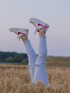 Preview wallpaper legs, sneakers, field, ears