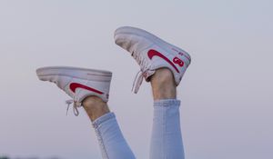 Preview wallpaper legs, sneakers, field, ears