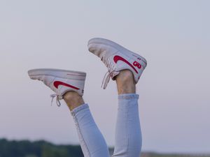 Preview wallpaper legs, sneakers, field, ears