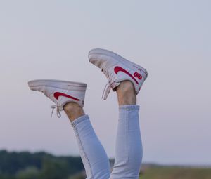Preview wallpaper legs, sneakers, field, ears
