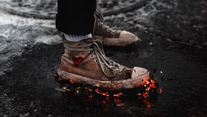 Preview wallpaper legs, sneakers, fire, asphalt, snow