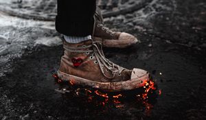 Preview wallpaper legs, sneakers, fire, asphalt, snow