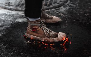 Preview wallpaper legs, sneakers, fire, asphalt, snow