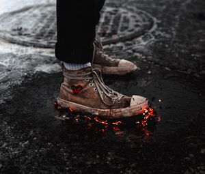 Preview wallpaper legs, sneakers, fire, asphalt, snow