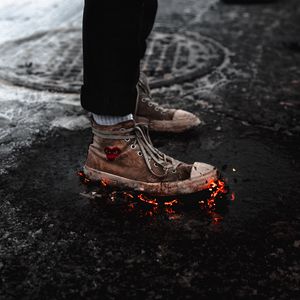 Preview wallpaper legs, sneakers, fire, asphalt, snow