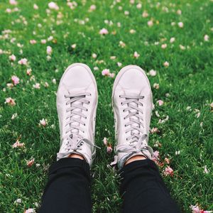 Preview wallpaper legs, sneakers, grass