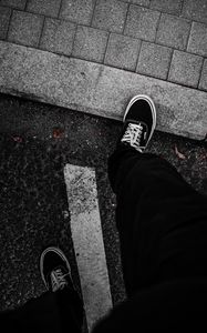 Preview wallpaper legs, sneakers, man, asphalt
