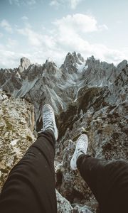 Preview wallpaper legs, sneakers, mountains