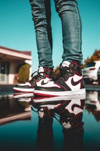 Preview wallpaper legs, sneakers, puddle, reflection