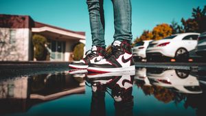 Preview wallpaper legs, sneakers, puddle, reflection