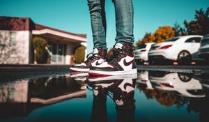 Preview wallpaper legs, sneakers, puddle, reflection
