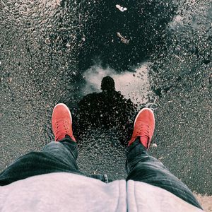 Preview wallpaper legs, sneakers, reflection, asphalt