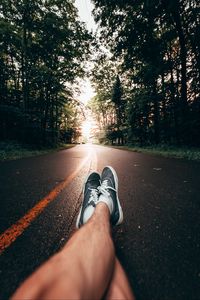 Preview wallpaper legs, sneakers, road, marking, trees