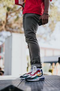 Preview wallpaper legs, sneakers, style, hand