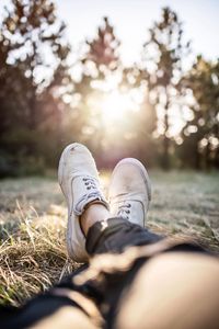 Preview wallpaper legs, sneakers, sun, sunlight, glare, white