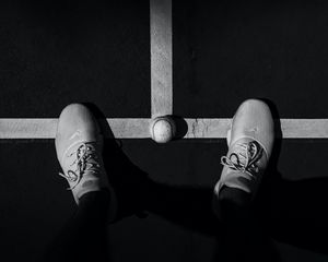 Preview wallpaper legs, sneakers, tennis ball, bw