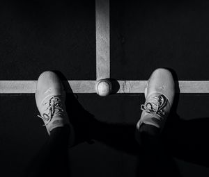 Preview wallpaper legs, sneakers, tennis ball, bw