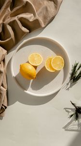 Preview wallpaper lemon, fruit, citrus, slices, bowl