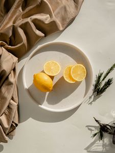 Preview wallpaper lemon, fruit, citrus, slices, bowl