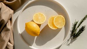 Preview wallpaper lemon, fruit, citrus, slices, bowl