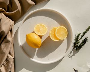 Preview wallpaper lemon, fruit, citrus, slices, bowl