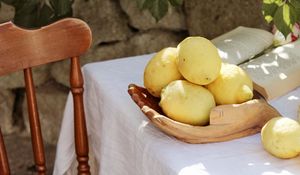 Preview wallpaper lemons, citruses, flowers, hat, chair, table